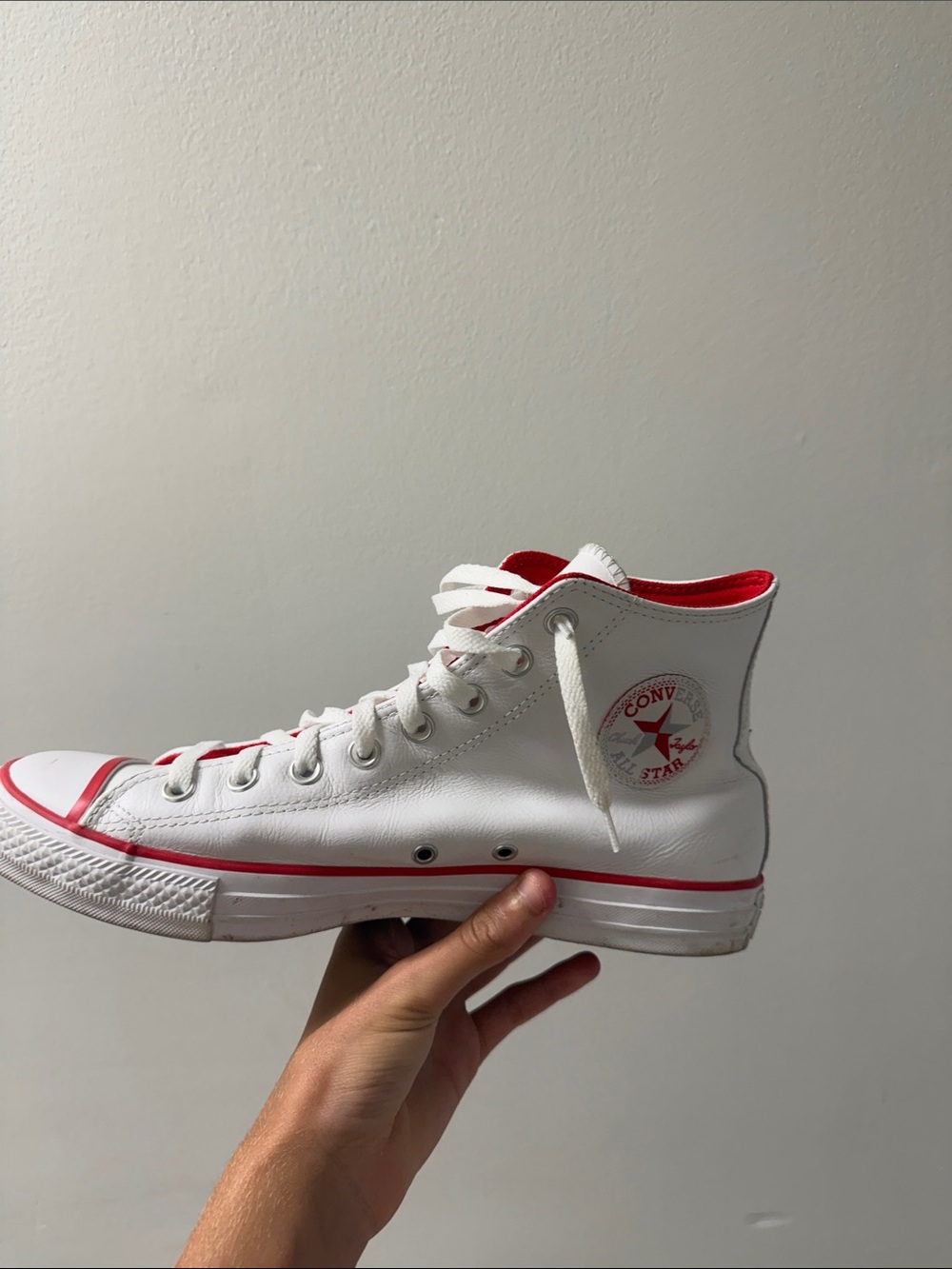 Converse White High Top Sneakers with Red Accents